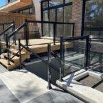 patio railing with aluminum and glass on a rear deck and walk out in toronto