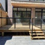 aluminum railing with glass on a patio in toronto