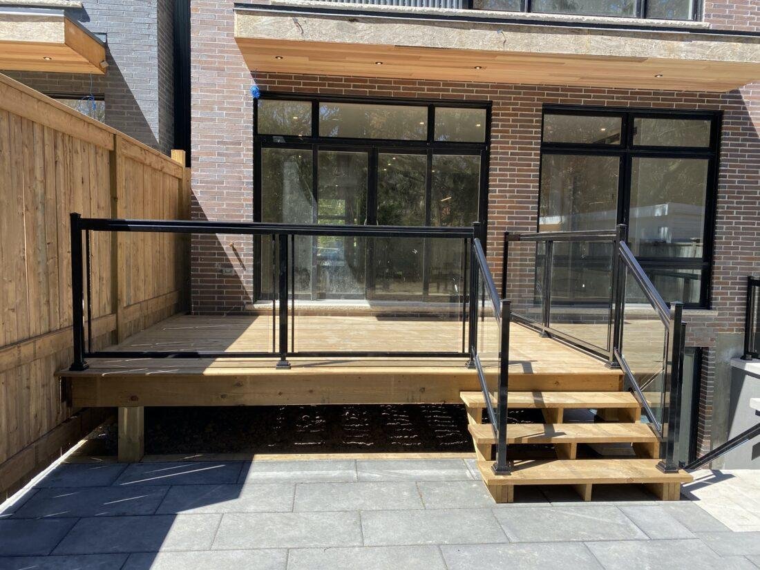 aluminum railing with glass on a patio in toronto