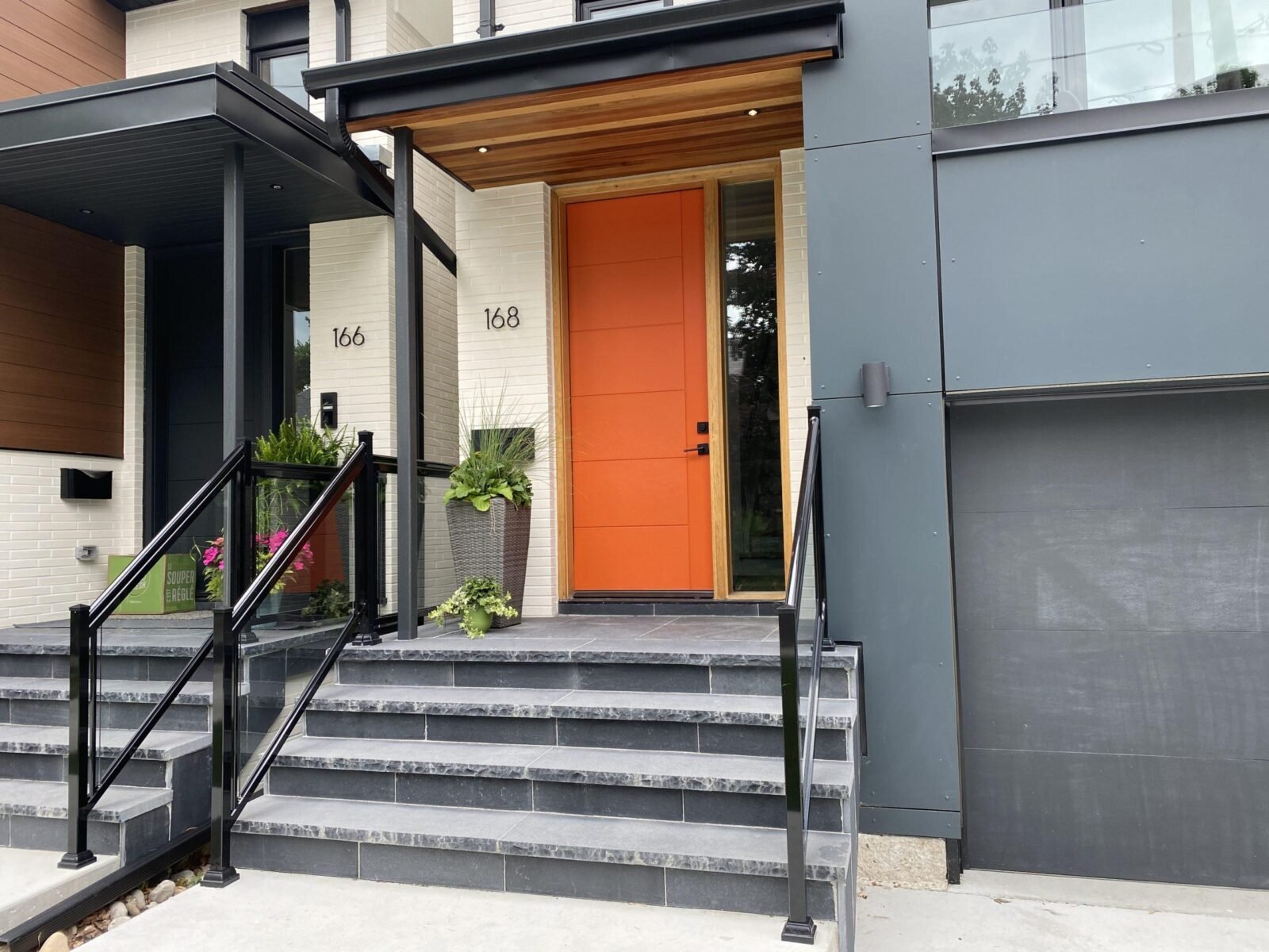 aluminum railing with glass on a front porch in toronto