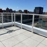 white aluminum glass railing on patio