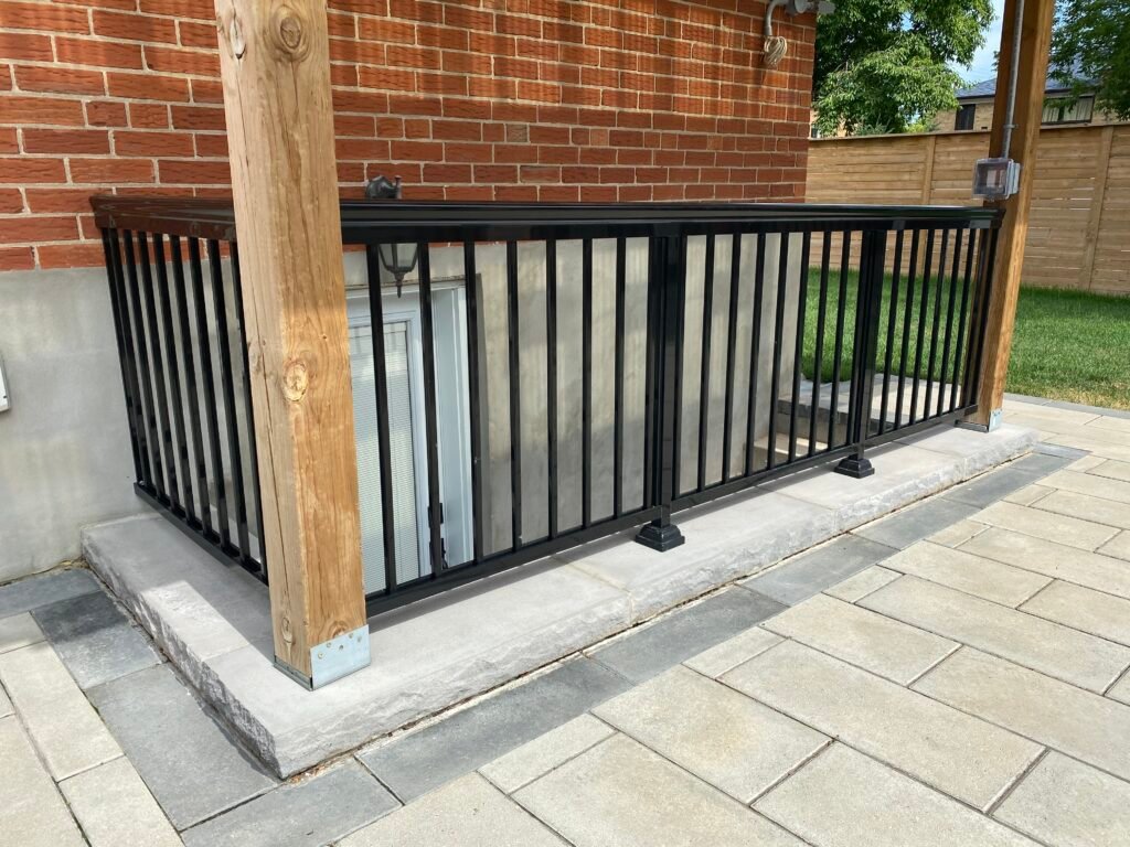 A bench in front of a brick building

Description automatically generated