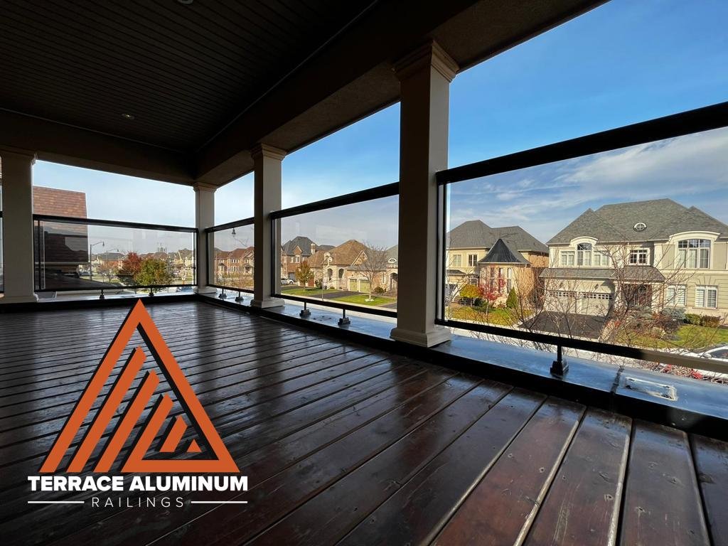 glass balcony railing with a beautiful view